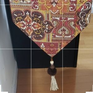 Table Runner Upholstery Burnt Orange Alegent Print With Decorative Tassels.